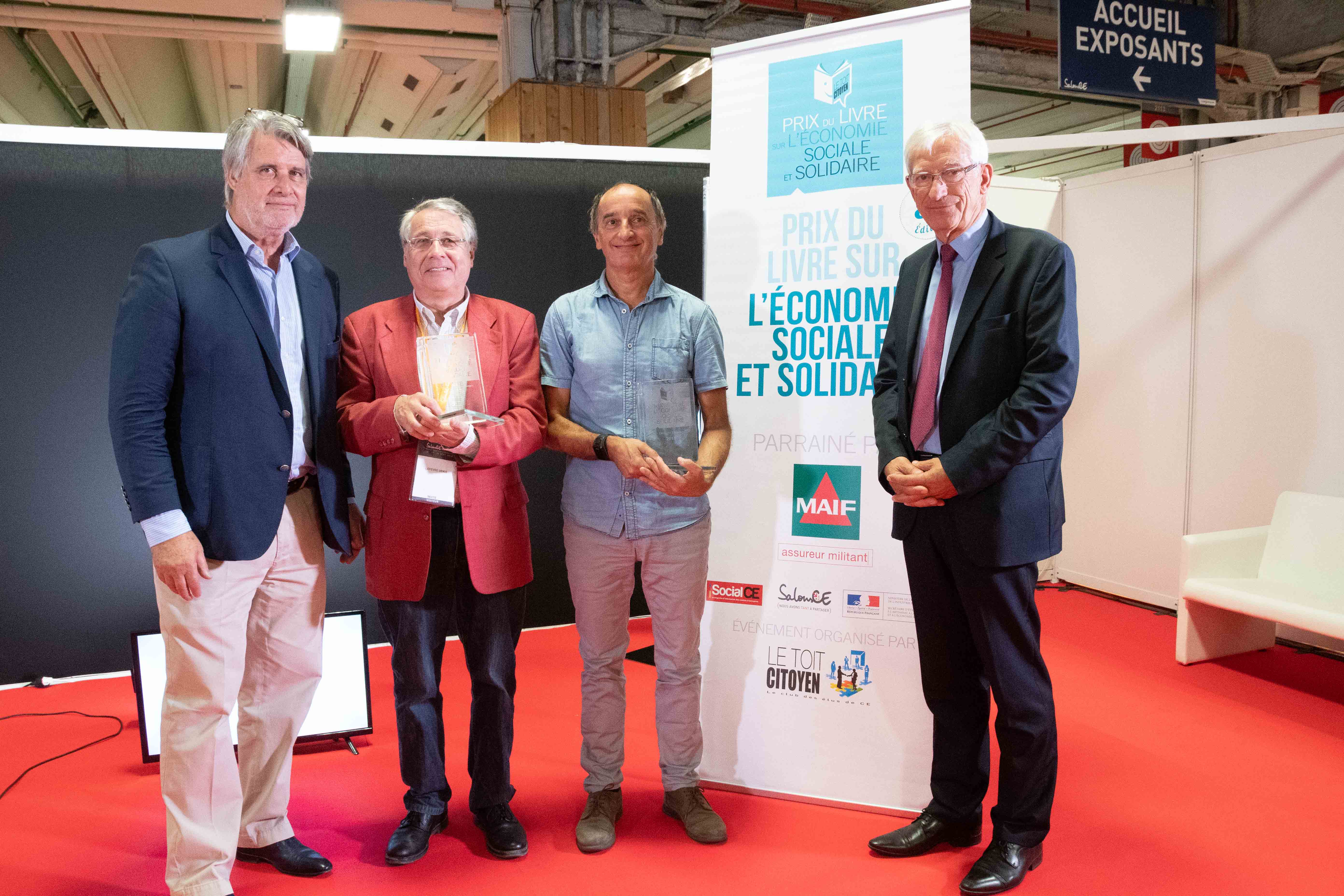 Roger Belot et Patrick Gobert  entourent Denis Lefèvre (à gauche) et Jean-François Draperi, les lauréats 2018. Photo Catherine Cros -